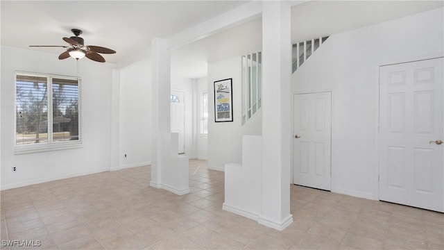 interior space featuring ceiling fan