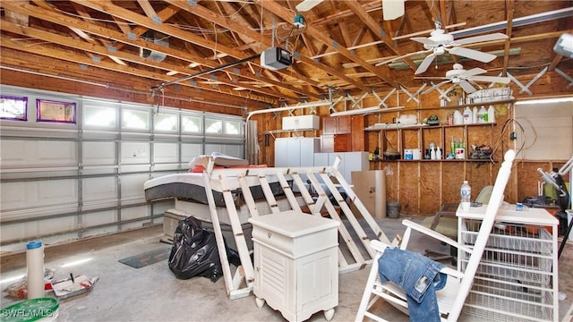 garage featuring ceiling fan and a garage door opener