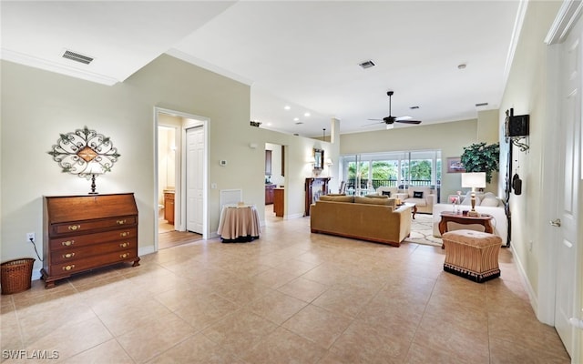 living room featuring ceiling fan, crown molding, and light tile patterned floors