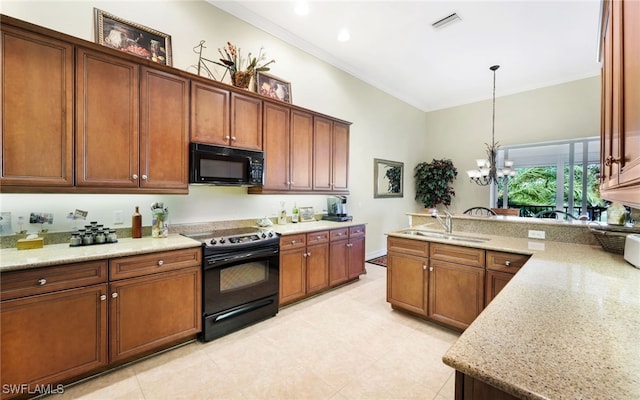 kitchen with pendant lighting, black appliances, sink, light stone countertops, and a chandelier