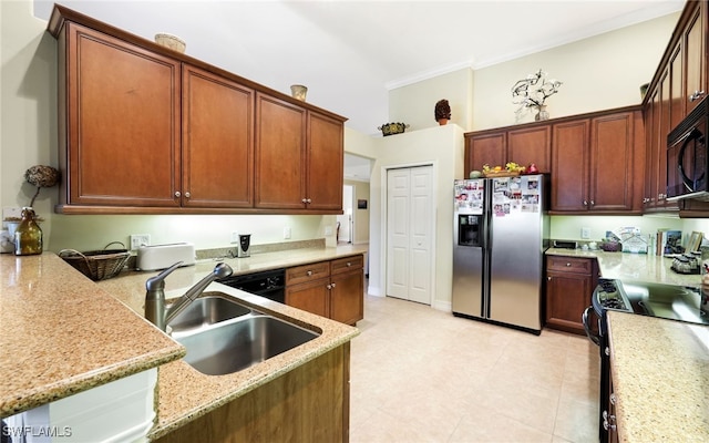 kitchen featuring sink, stainless steel refrigerator with ice dispenser, range with electric stovetop, ornamental molding, and light stone counters