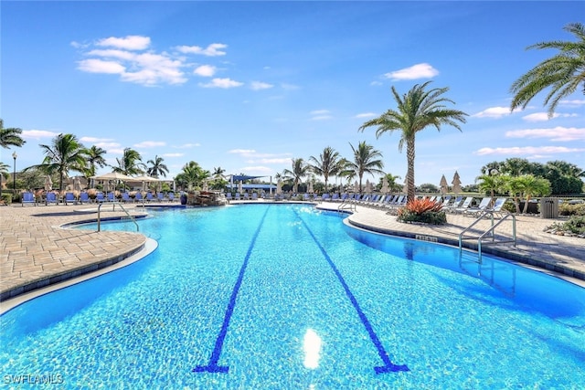 view of swimming pool with a patio area