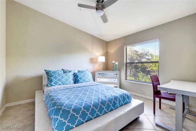 tiled bedroom with ceiling fan