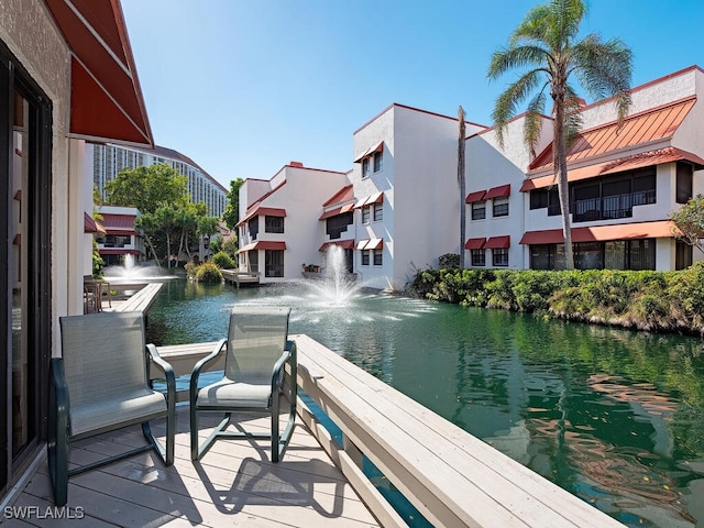 dock area featuring a water view