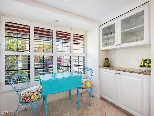 dining room featuring light tile patterned floors