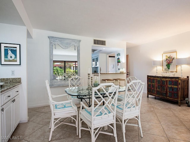 view of tiled dining area