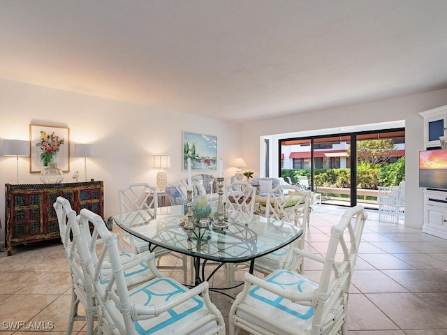 dining area with light tile patterned floors