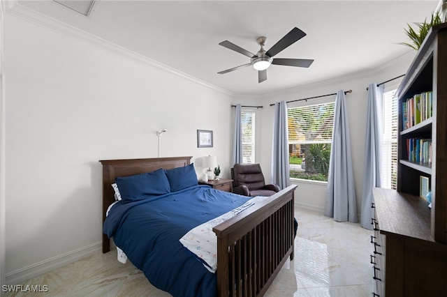 bedroom with a ceiling fan, baseboards, and ornamental molding