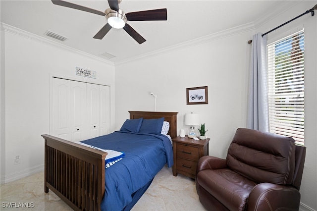 bedroom with visible vents, marble finish floor, a ceiling fan, a closet, and crown molding