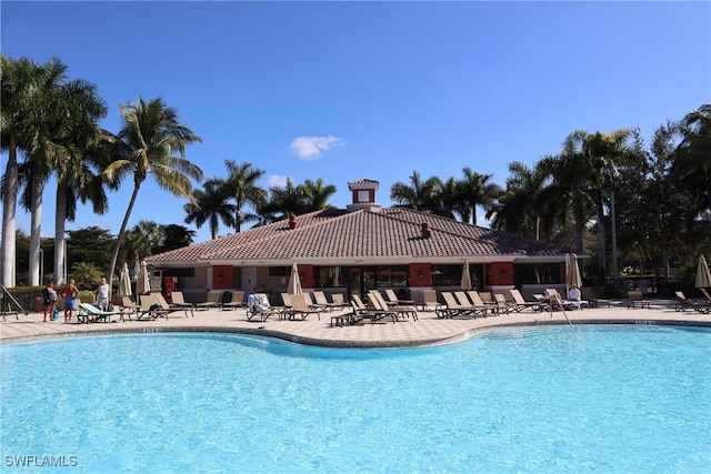 community pool with a patio