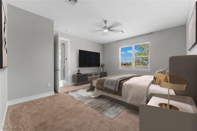 bedroom with baseboards, carpet flooring, a ceiling fan, and visible vents