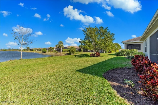 view of yard with a water view