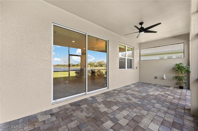 view of patio with ceiling fan