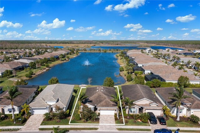 bird's eye view featuring a residential view and a water view