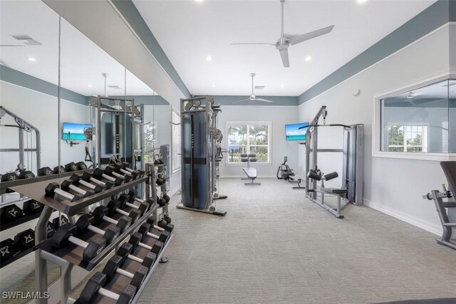 workout area with ceiling fan and carpet floors