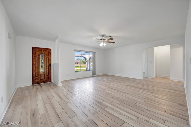 foyer entrance featuring ceiling fan and light hardwood / wood-style flooring