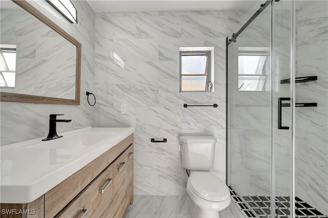 bathroom with an enclosed shower, vanity, toilet, and tile walls