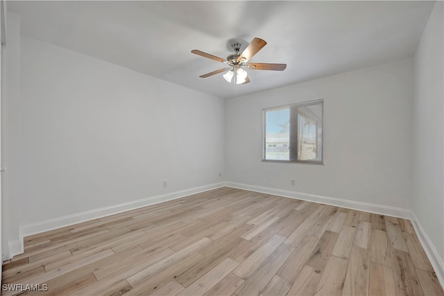 spare room featuring ceiling fan and light hardwood / wood-style floors