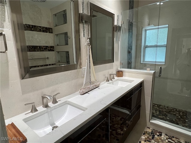 bathroom with vanity and walk in shower