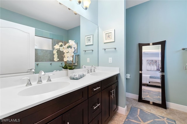 bathroom featuring tile patterned floors and vanity