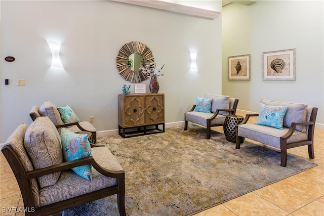 living area featuring tile patterned floors