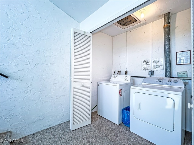 washroom with carpet flooring and washer and clothes dryer