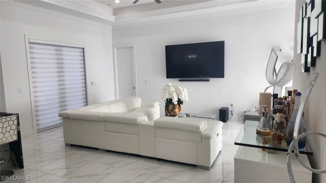 living room featuring crown molding and ceiling fan