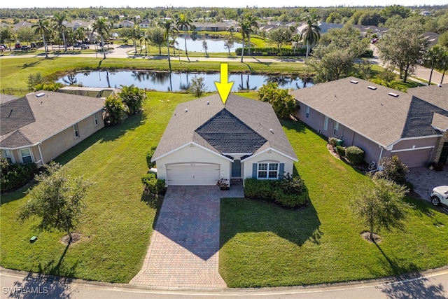 drone / aerial view featuring a water view