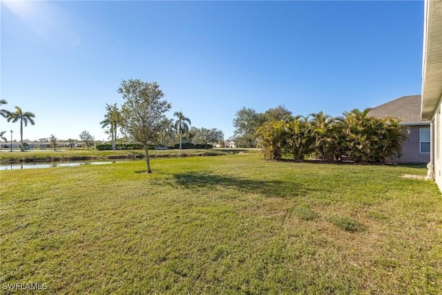 view of yard featuring a water view