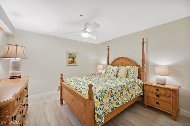 bedroom featuring ceiling fan and light hardwood / wood-style flooring