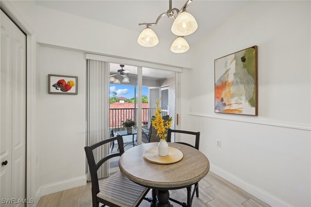 dining space featuring ceiling fan and light hardwood / wood-style flooring