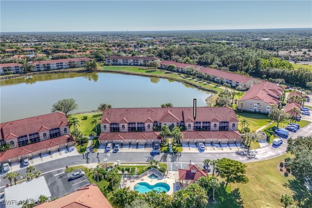 drone / aerial view featuring a water view