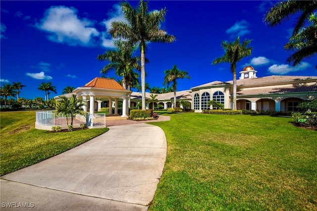 view of community with a gazebo and a lawn