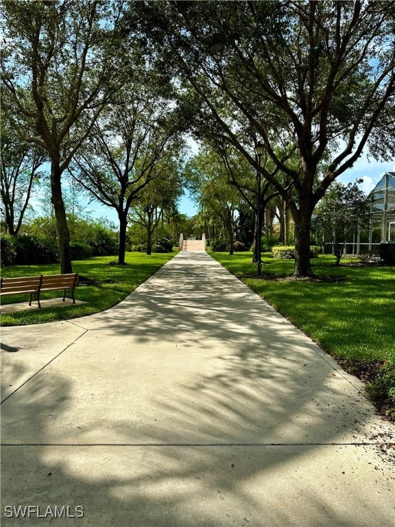 surrounding community featuring a lawn