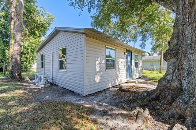 view of property exterior with ac unit