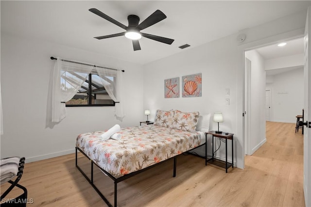 bedroom featuring ceiling fan and light wood-type flooring