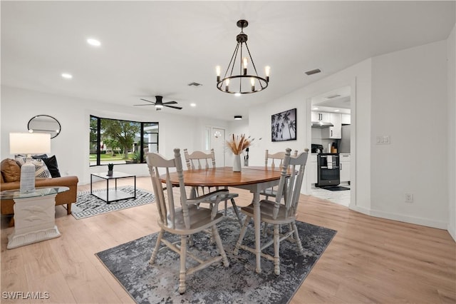 dining room featuring ceiling fan and light wood-type flooring