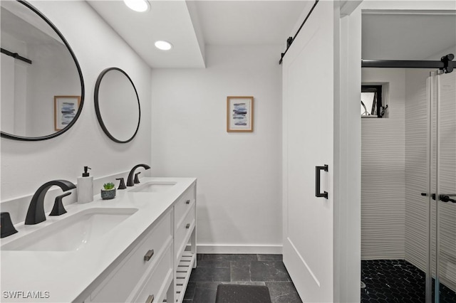 bathroom with an enclosed shower and vanity