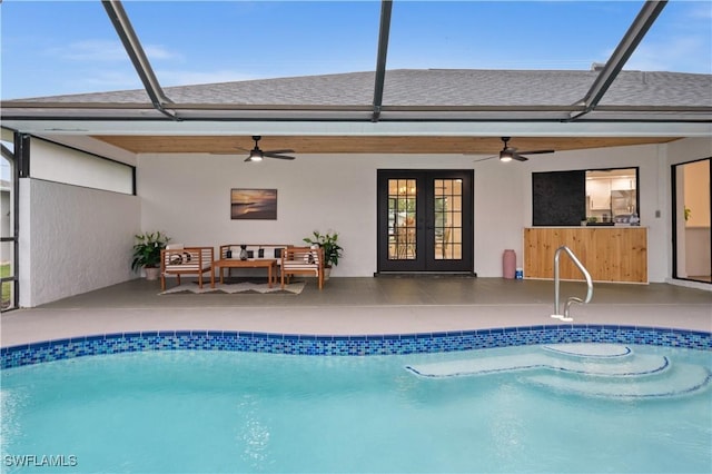 rear view of house featuring ceiling fan, a patio, french doors, and outdoor lounge area