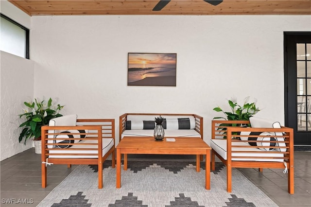 living area featuring wooden ceiling