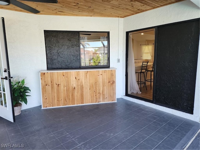 interior space featuring ceiling fan