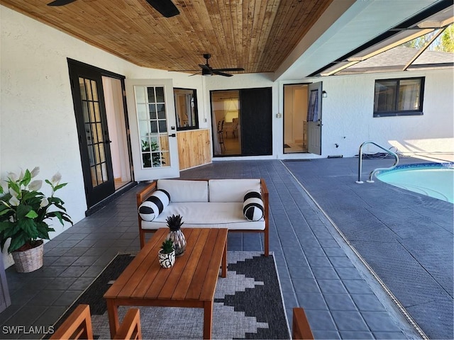 exterior space featuring ceiling fan and an outdoor hangout area