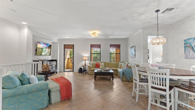 tiled living room with a notable chandelier and ornamental molding