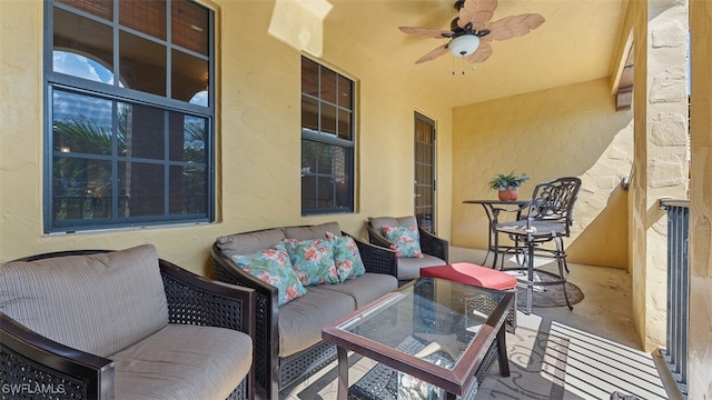 exterior space featuring an outdoor living space and ceiling fan