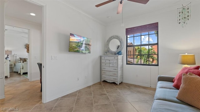 living room with ceiling fan, light tile patterned floors, and ornamental molding