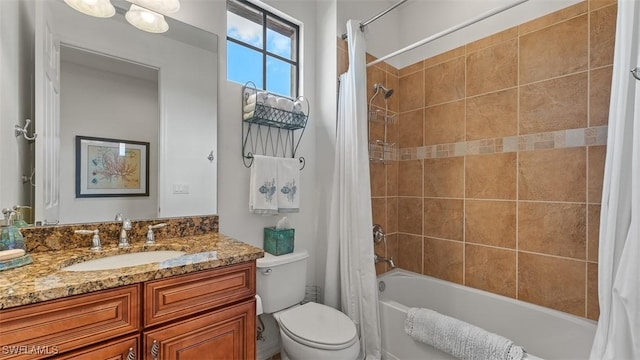 full bathroom with vanity, toilet, and shower / bathtub combination with curtain