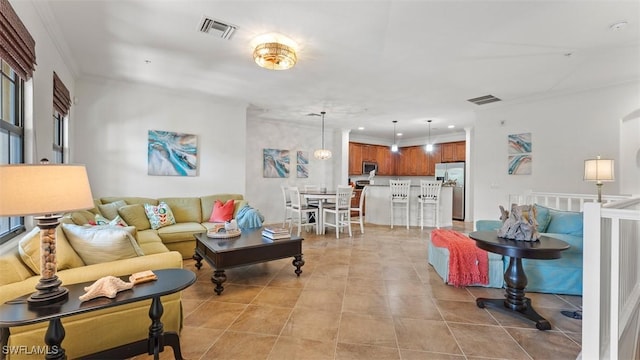 tiled living room with crown molding