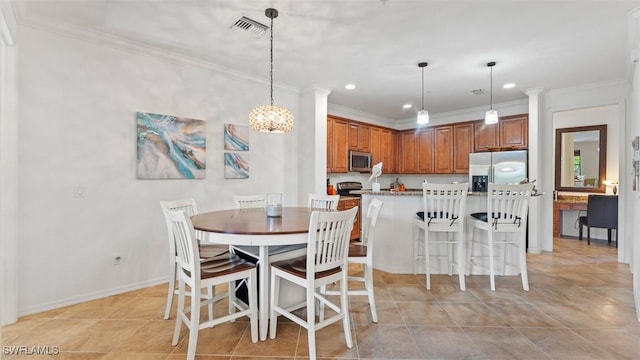 dining area featuring light tile patterned floors and ornamental molding