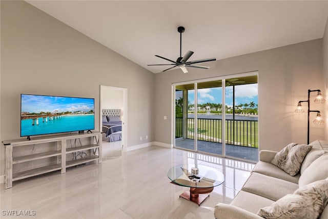 tiled living room with ceiling fan and lofted ceiling