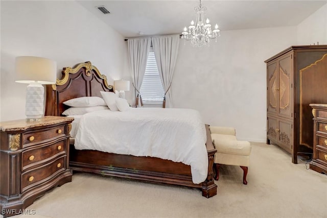 bedroom featuring light carpet and a chandelier